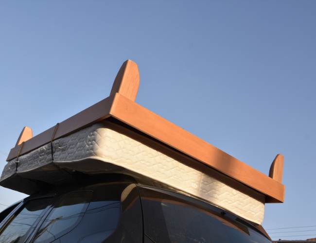 Wind in your hair, mattress on top? Hold on! Dive into legality, logistics & smart hacks for a safe (and legal) roof-top mattress adventure. #mattress on car roof, #road trip essentials, #car roof cargo, #legal considerations, #travel hacks, #fuel efficiency, #safety tips, #alternative transport options,